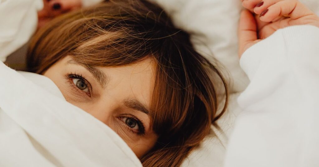 Woman waking up between 2 and 4am during perimenopause